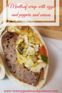 Meatloaf wrap with eggs pappers and onions